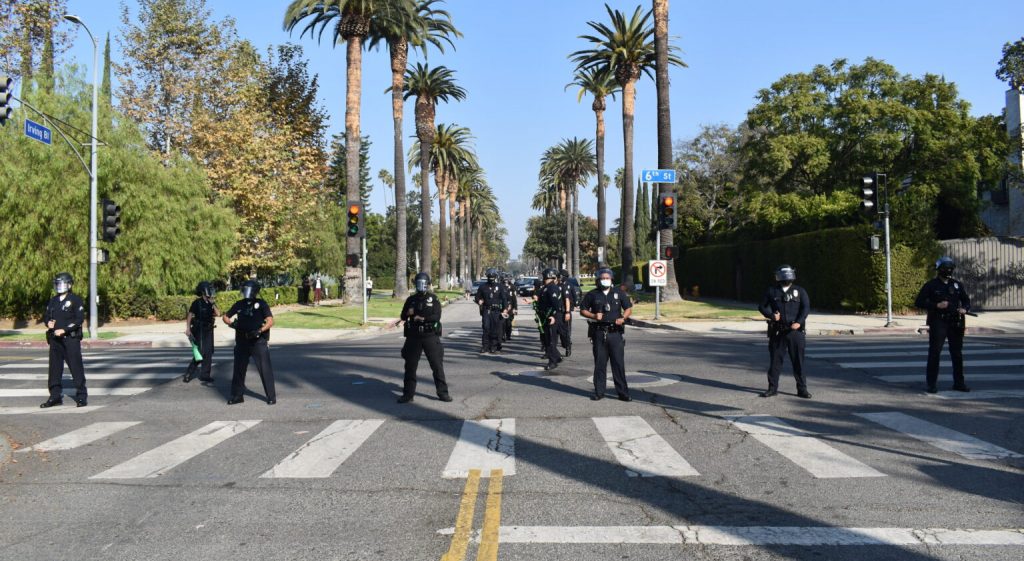 Los Angeles Police Department officers form a skirmish line outside of the Getty House in November 2020. (Cerise Castle)